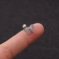 Macro view of a crystal bow ear stud with silver metal and ball back closure - Full Zirconia Bow Ear Bone Nail (HSPJ1915-8#)