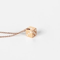 Rose gold necklace with a detailed minimalist lucky dice pendant on a white background - Rose Gold