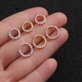 Close-up of 20G copper hoop rings with inlaid zircons in gold, silver, and rose gold - Front Inlaid / 6MM Silver