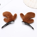Detail of plush brown reindeer antler hair clips with metal BB clips for holiday styling - Cloth Reindeer Antler - Brown Pair