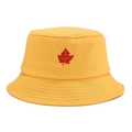 Detailed close-up of yellow cotton bucket hat with red maple leaf embroidery texture - Leaf Yellow