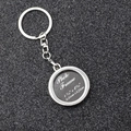 Close-up of heart-shaped silver photo frame keychain with dimensions 3.35cm x 3.75cm - Round Photo Frame