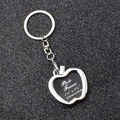 Silver apple-shaped photo frame keychain on black background, fits 3.2cm square pictures - Apple Photo Frame