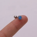 Silver stainless steel cartilage stud earring with a round blue opal and beaded edge decoration - Royal Blue