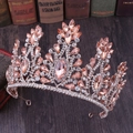 Close-up of a rose gold bridal crown with peach marquise crystals and sparkling rhinestones - Rose Gold Peach Rhinestone