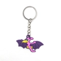 Detailed view of pink PVC pterodactyl dinosaur keychain with purple polka dot wings - Pink Pterosaur