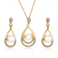 Elegant gold teardrop jewelry set featuring a pearl necklace and matching stud earrings - KC Gold 2598 (2-Piece Set)