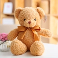 Lindo oso de peluche marrón dorado con gran lazo de satén dorado y suave pelaje rizado - Oso Con Lazo Beige