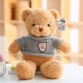 Oso de peluche marrón claro con jersey de punto gris y parche de cuero decorativo - Oso Con Suéter Beige