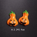 Detailed view of 2.2x2.9cm orange resin Halloween pumpkins with classic Jack-O-Lantern faces - Style H-Round Pumpkin Face