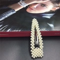 Elegant large pearl BB hair clip with white pearls and metal base on a fashion magazine - 9cm Pearl Large Waterdrop Silver