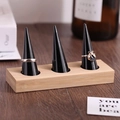 Bamboo and wood jewelry stand with three black cone ring holders and a solid rectangular base - 3-Slot Black / Black