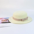 Beige kids straw hat with brown ribbon bow and white stitching for summer sun protection - Milk White - Bowknot Flat Top