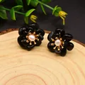 Elegant 925 silver black flower earrings with freshwater pearls and gold-tone centers - Agate