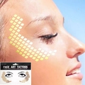 Detail of gold scale face tattoos applied around eyes for festive makeup looks - LT06 Gold Scales Decor