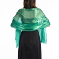 Close-up of green sheer tulle shawl showing its lightweight texture and glossy finish - Dark Green