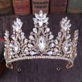 Elegant gold bridal crown featuring clear rhinestones and marquise crystals on dark background - KC Gold White Rhinestone