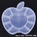 Macro top view of transparent apple-shaped plastic jewelry box with 11 sections 15x14x2.5cm - Apple Shaped Multi-grid Organizer