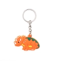 Macro detail of cute orange PVC triceratops keychain with silver stainless steel ring - Orange Triceratops