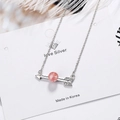 Collar de flecha de corazón con piedra lunar y cuenta rosa sobre plumas blancas - Cobre / Cristal de Fresa Rosa