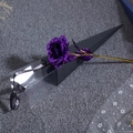 Detailed close-up of a purple 24K gold foil rose inside a premium black gift box packaging - PVC Triangle Gift Box / Purple / PVC Packaging