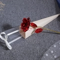 Close-up of red 24K gold foil rose in elegant beige cone gift box with white ribbon - PVC Triangle Gift Box / Red / PVC Packaging