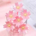 Penna gel fiore di ciliegio rosa con impugnatura in silicone morbido e punta 0.5mm - Gemma Gialla