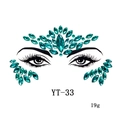 Detail of emerald green resin face gems in teardrop shapes for EDM music festivals - YT-33