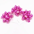 Mini 1-inch magenta plaid star bow for gift wrapping on white card backing - Rose Red