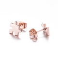 Macro detail of rose gold puzzle piece stud earrings with high-polish mirror finish - Puzzle Style (140) / Rose Gold