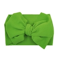 Vibrant green knit baby headband with oversized bow detail in a textured fabric - Grass Green