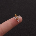 Detailed close-up of a tiny golden bow piercing with sparkling clear zircon stones - Gold Bowknot Pendant Style (Gold 5#)