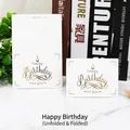 Elegant white folded birthday card featuring gold foil Happy Birthday text and cake icon - 12 Happy Birthday
