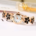 Elegante orologio da donna in oro rosa con bracciale a quadrifoglio in smalto nero - Nero