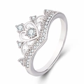 Detailed 45-degree angle of a silver crown ring with sparkling cubic zirconia stones - US 6 / White Gold