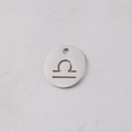 Macro view of 12mm stainless steel mirror finish pendant featuring Libra zodiac cutout - Libra