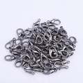 Close-up of bulk gunmetal black alloy lobster clasps for DIY jewelry making and necklaces - 14mm / Gun Black