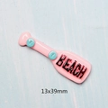Pink resin bottle charm with BEACH engraving and 13x39mm dimensions for DIY crafts - Pink Oar
