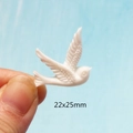 Macro shot of 22x25mm white resin swallow bird charm for DIY jewelry making - White Seagull