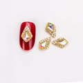 Drachenförmiger Nagelschmuck aus Goldlegierung mit AB-Kristall und Strasssteineinfassung - AB Rot mit AB Strass (1570)