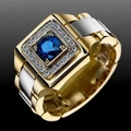 Luxe herenring in goud en zilver met een grote ronde blauwe edelsteen en witte zijsteentjes - US 12 / Goud Zilver Tweekleurig met blauwe edelsteen