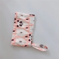 Close-up of the cotton fabric with cute panda and polar bear cartoon prints and a wrist strap - Pink Bear Head
