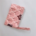 Detail of coral pink cotton phone bag with brown bear print and portable wrist strap - Pink Jungle Bear