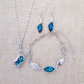 Detailed view of silver crystal jewelry set with blue leaf gems and clear stones - Peacock Blue Silver