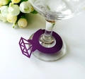 Purple diamond ring cup card for weddings shown on a wine glass base on white background - Deep purple