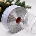 Nastro natalizio argento con motivo a spirale glitterato e bordi metallici cablati - 5cm Argento
