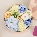 Pink round gift box with blue and yellow soap flower arrangement and a satin ribbon - 16.2x16.2x8.2cm / Blue