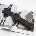 Bohemian black woven elastic belt with a round wooden buckle on a fashion magazine - Round Pinless Wood Buckle / Black