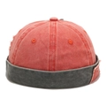 Dettaglio del cappello docker vintage patchwork con fori e tela rossa lavata - Regolabile / Arancione