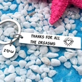 Polished stainless steel keychain with humorous engraving on vibrant textured background - 1032.1 Mirror Style